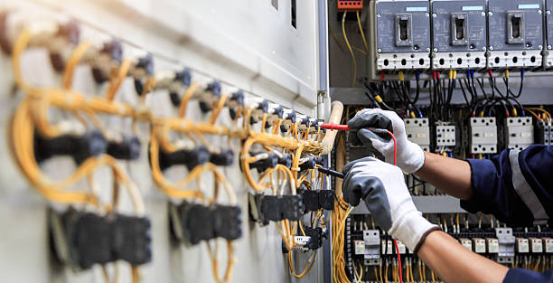 Professional Electrician technician working in North River Shores, FL